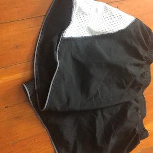 Black and white running shorts